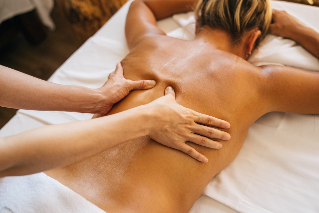 Deep tissue Massage on a Client's Bare Back