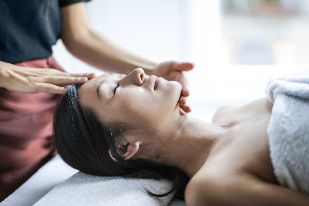 Woman Getting an Indian head massage